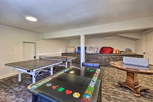 a ping pong room with two ping pong tables at Ridgeline Retreat with Mountain Lake Views! in Lake Arrowhead