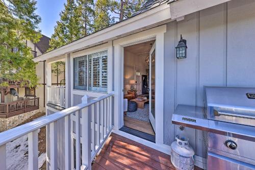 a porch of a house with a porch istg istg at Ridgeline Retreat with Mountain Lake Views! in Lake Arrowhead