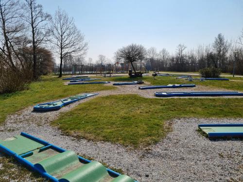 a group of inflatable tubes in a park at Vakantie vieren aan het Sneekermeer in Offingawier