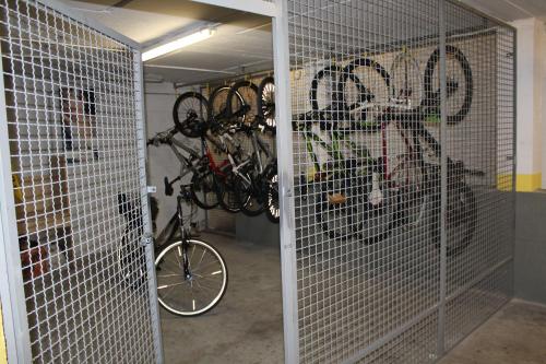 a room with a bunch of bikes in a garage at Hotel Toresela Bike am Gardasee in Nago-Torbole