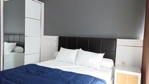 Ένα ή περισσότερα κρεβάτια σε δωμάτιο στο Ruby Apartment #6