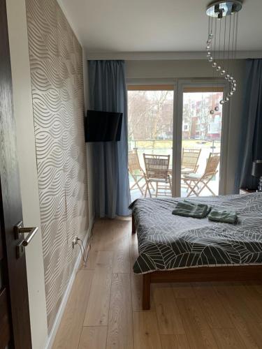 Posteľ alebo postele v izbe v ubytovaní LUX Apartament Polanki - Kołobrzeg