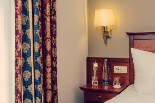Katil atau katil-katil dalam bilik di Landhotel Hallnberg