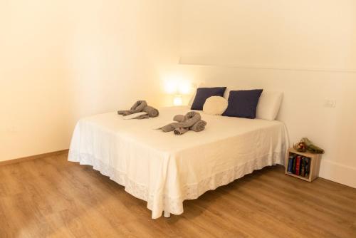 Postel nebo postele na pokoji v ubytování BORGOROMA - Business & Residence