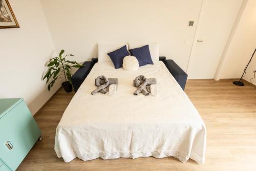 Postel nebo postele na pokoji v ubytování BORGOROMA - Business & Residence