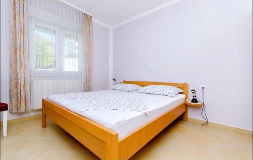 Posteľ alebo postele v izbe v ubytovaní Palma 4