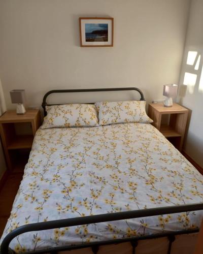 Postel nebo postele na pokoji v ubytování Atlantic Bay Cottage