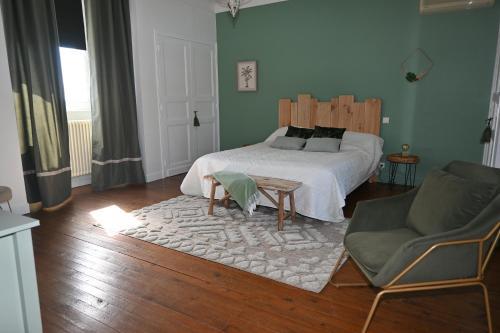 Posteľ alebo postele v izbe v ubytovaní Domaine de Daspe