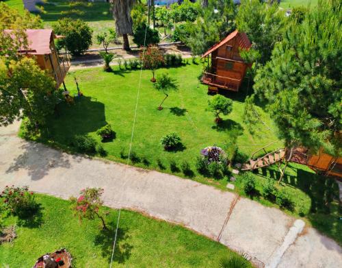 an aerial view of a yard with a house at Luna treehouse in Preveza