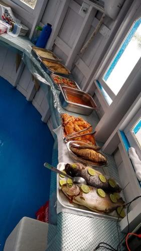 a group of different types of food on a table at Amazon Boto Lodge Hotel in Careiro