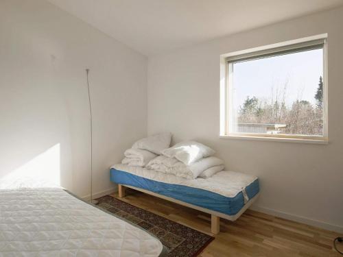 Postel nebo postele na pokoji v ubytování Holiday home Skibby IX