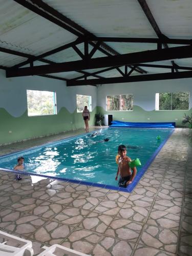Kolam renang di atau dekat dengan Pousada Recanto Águas Vivas
