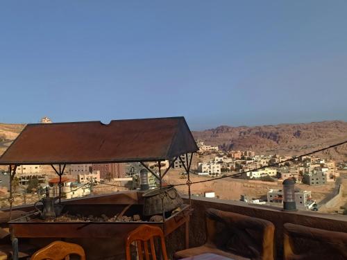 a view of a city from a balcony at Petra Desert Dream Hotel in Wadi Musa