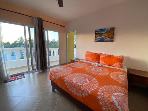 Postel nebo postele na pokoji v ubytování Diamond Hotel Cabarete