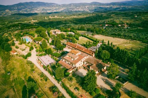an aerial view of a house with trees at Usignoli Apartments - Happy Rentals in Reggello