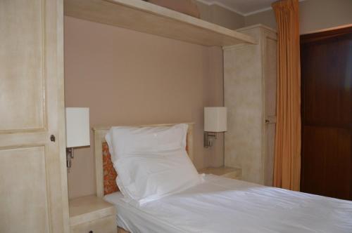 Katil atau katil-katil dalam bilik di Roccamonfina Palace Hotel