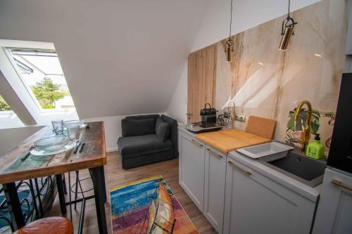 Fotografie z fotogalerie ubytování TGA Boutique Apartman v destinaci Balatonlelle