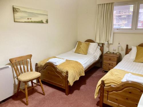 Krevet ili kreveti u jedinici u okviru objekta Harbour Views Porthmadog 1102B