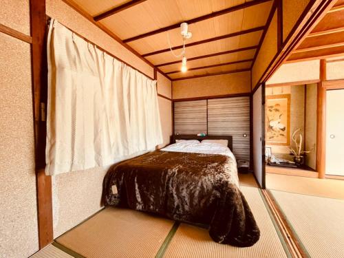 皆様お宿　川風にあるベッド