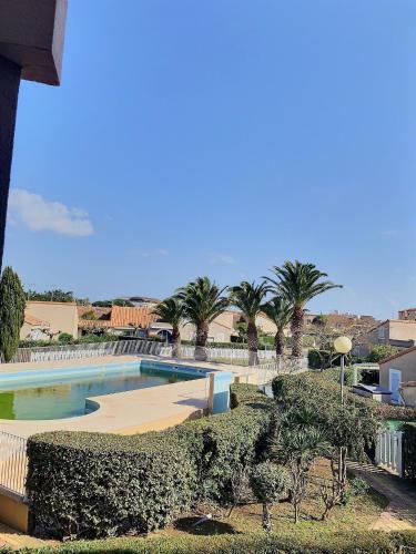 Studio cabine pour 4 personnes avec piscine commune