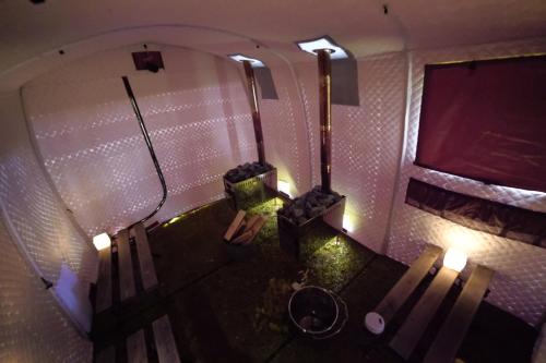 an overhead view of a bathroom with a toilet and lights at Lakeside Hotels Kuore in Kitashiobara