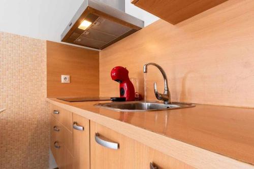 Kuchyňa alebo kuchynka v ubytovaní Apartamento 303 junto a la playa piscina y parking