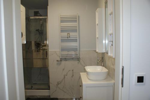 Kúpeľňa v ubytovaní APARTAMENT CENTRUM OLSZTYNA 2