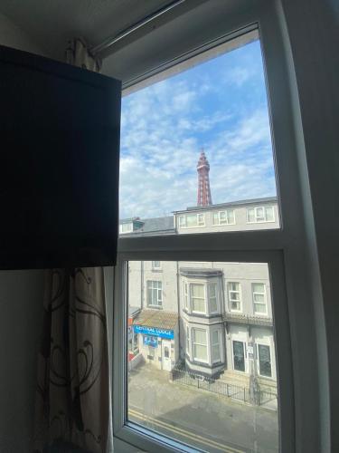 a window with a view of a building at Mellory hotel in Blackpool