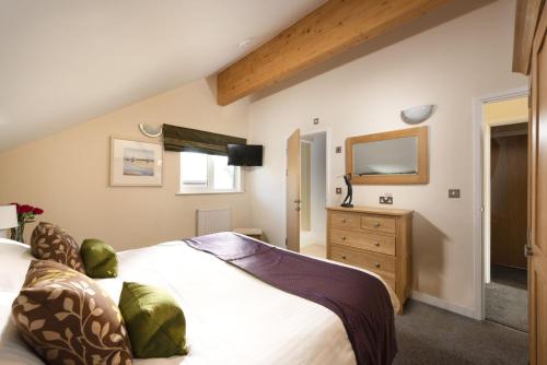 Postel nebo postele na pokoji v ubytování Lodge 40, Retallack Resort & Spa