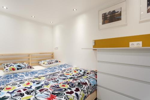 Postel nebo postele na pokoji v ubytování Appartement Petits Champs