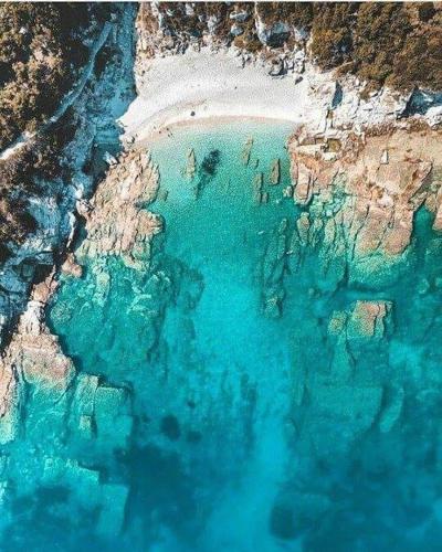 an aerial view of a beach and the ocean at Studio south Pilion in Chorto