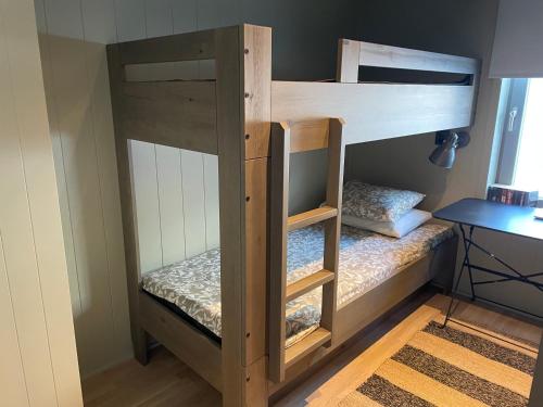 a couple of bunk beds in a room at Viste Funäsdalen in Funäsdalen