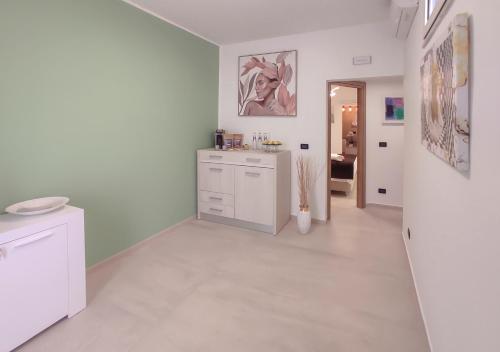 Kuchyň nebo kuchyňský kout v ubytování Althea B&B a Reggio Calabria