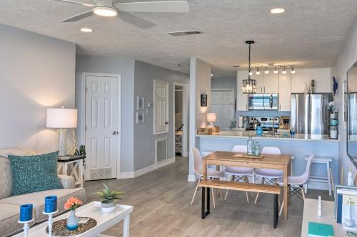a living room and kitchen with a table and a couch at Ocean-View Balcony Family Gem on Seawall Blvd! in Galveston