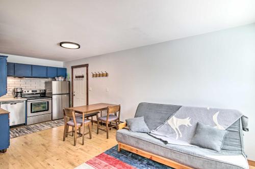a living room with a couch and a table at Prismatic Mountain Studio Less Than 1 Mi to Big Sky Resort in Big Sky