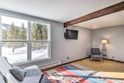 a living room with a couch and a window at Prismatic Mountain Studio Less Than 1 Mi to Big Sky Resort in Big Sky