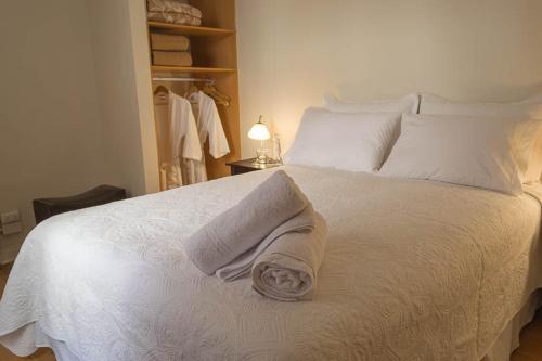 Postel nebo postele na pokoji v ubytování Hotel Boutique Casa Conde