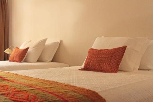 Postel nebo postele na pokoji v ubytování Hotel Boutique Casa Conde