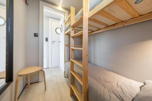 Letto o letti in una camera di The Homeboat Company Parque das Nações-Lisboa