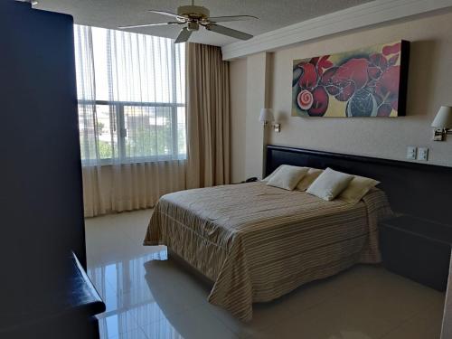 Ein Bett oder Betten in einem Zimmer der Unterkunft Hotel Mary Celaya