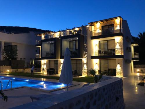 The swimming pool at or close to Stone House Aparts 1 plus 1 mit Poolterrasse Kalkan No 1