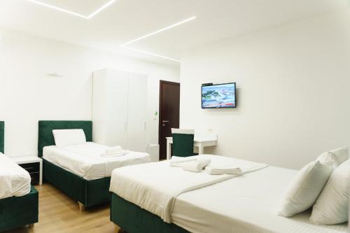 Postel nebo postele na pokoji v ubytování Hotel Camp Karagaq