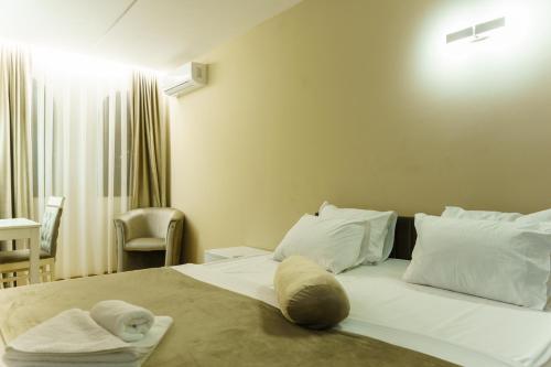 Postel nebo postele na pokoji v ubytování Hotel Camp Karagaq