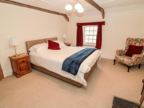 Voodi või voodid majutusasutuse 2 Redeswood Cottages toas