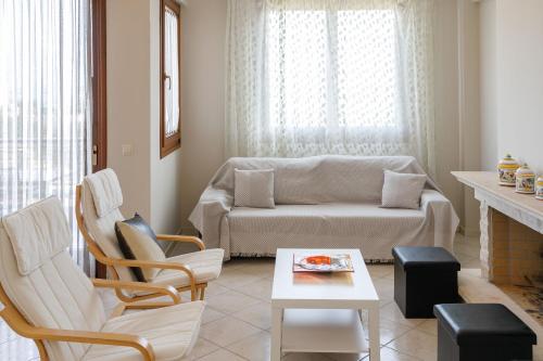 Χώρος καθιστικού στο Stella Luxury Residence