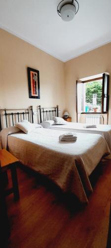 Postel nebo postele na pokoji v ubytování Casa La Barria