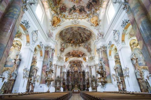a large church with a large ceiling at FeWo HoLiDay HouSE Allgäu in Ottobeuren
