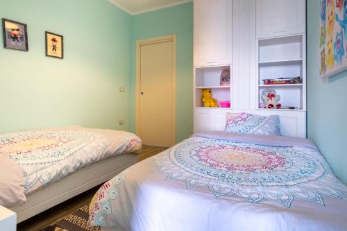 a bedroom with two beds in a room at Sunset House in Vlorë