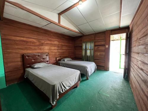 Krevet ili kreveti u jedinici u okviru objekta Hostal eco-aventura