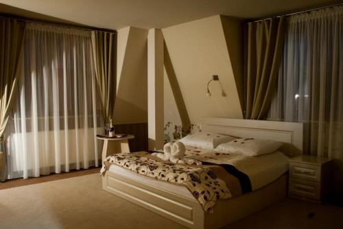 Ліжко або ліжка в номері Hotel Regent